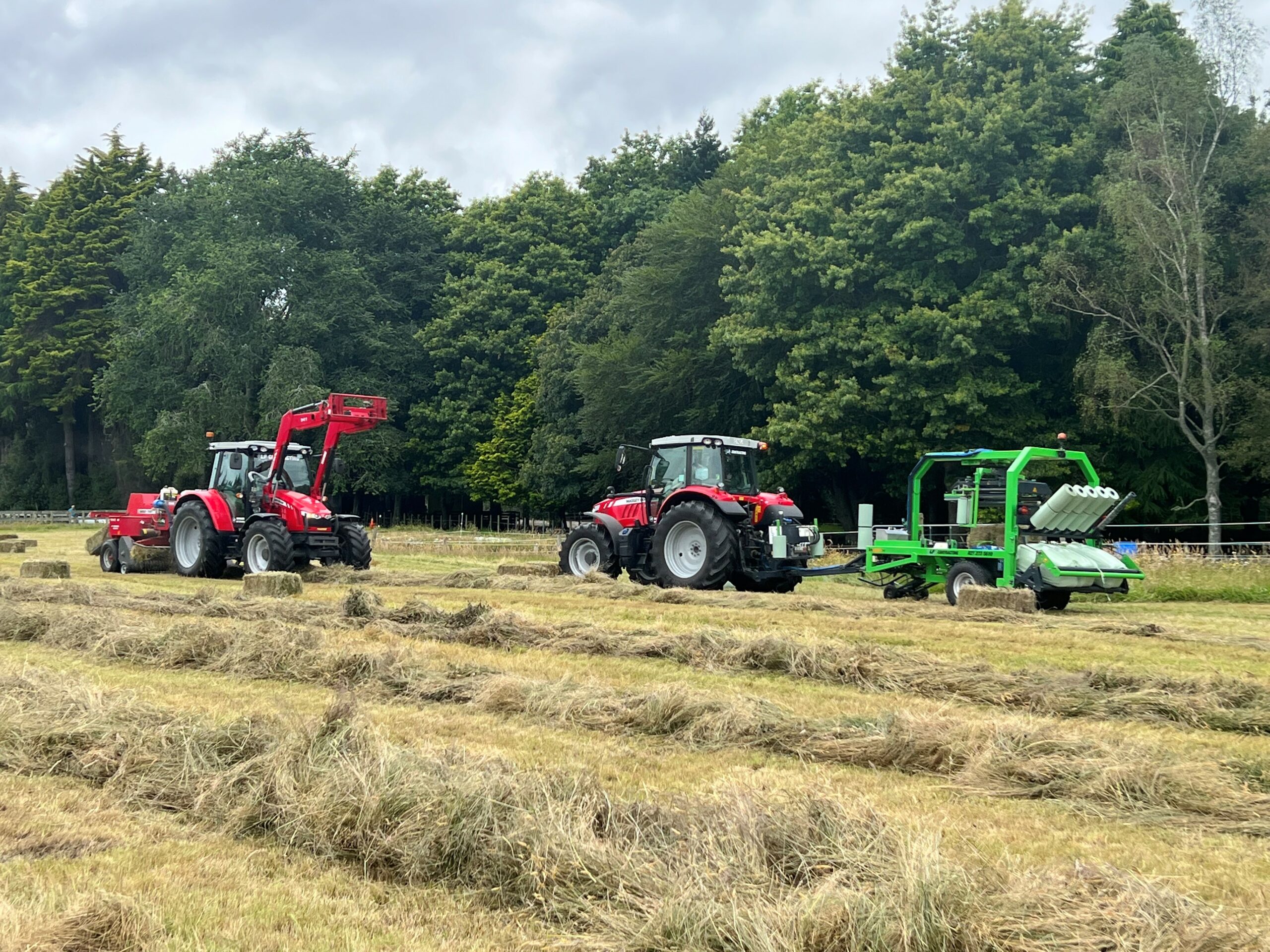This image shows Ross Flexman's silage-making machinery in action.